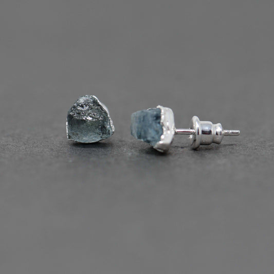 Silver stud earrings with Rough Aquamarine