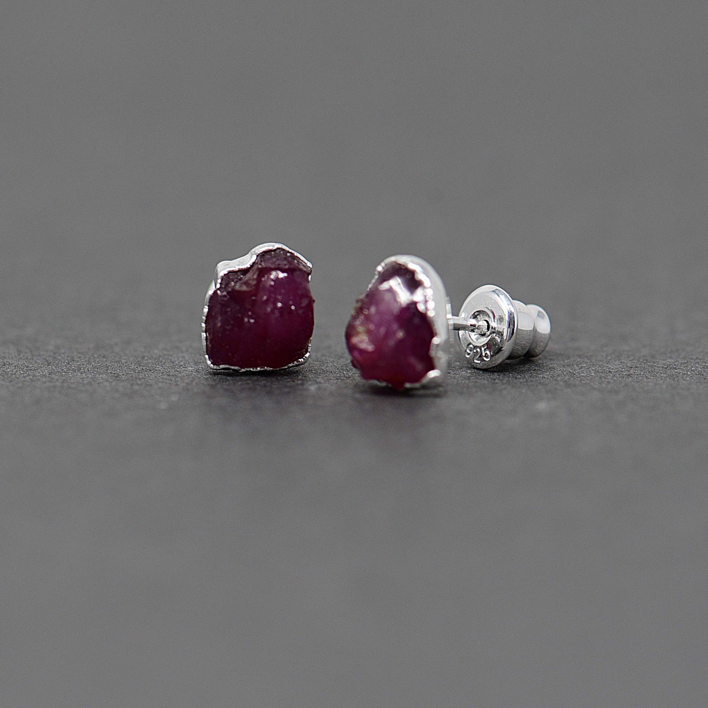 Silver stud earrings with Rough Ruby