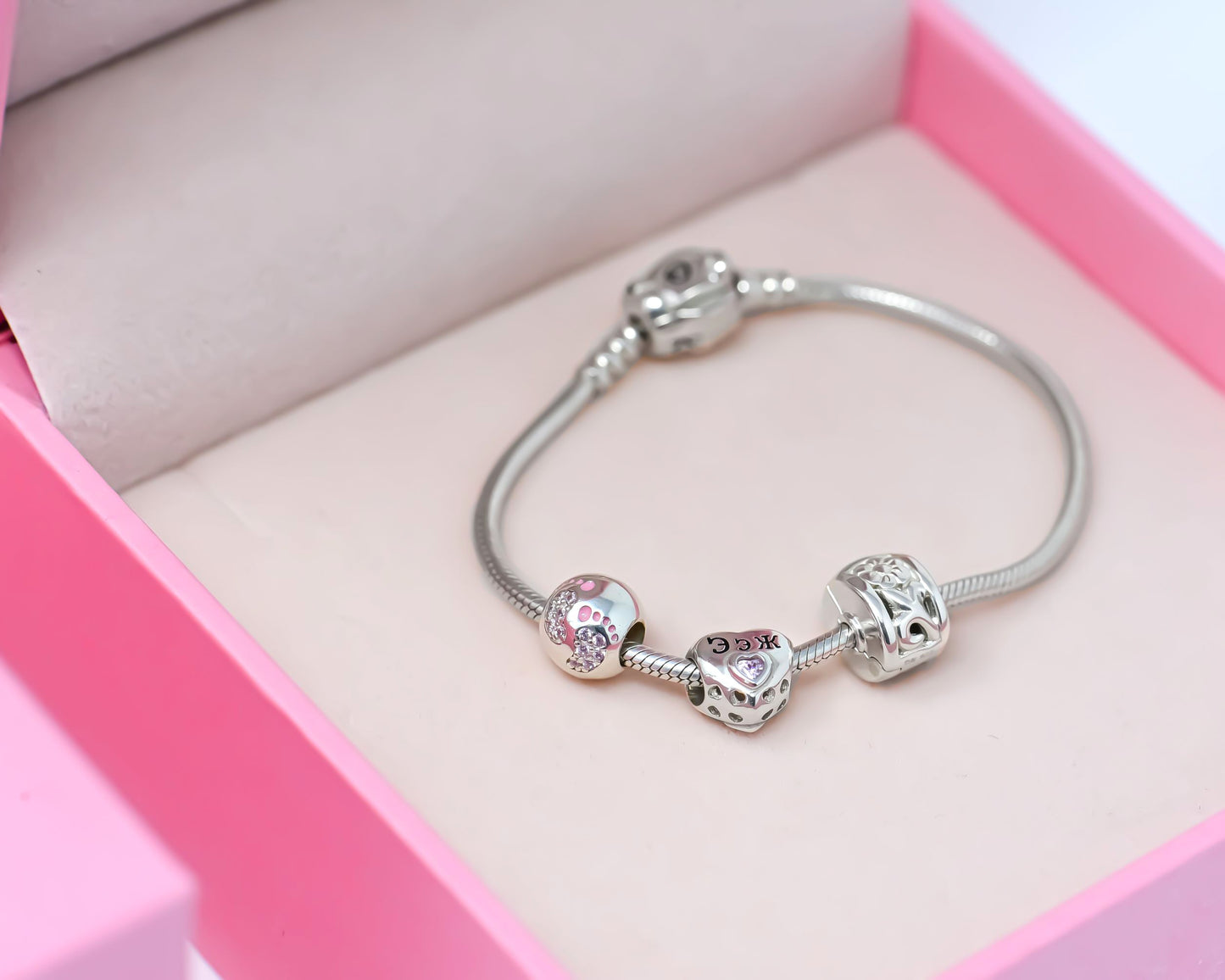 Kids silver bracelet with charms